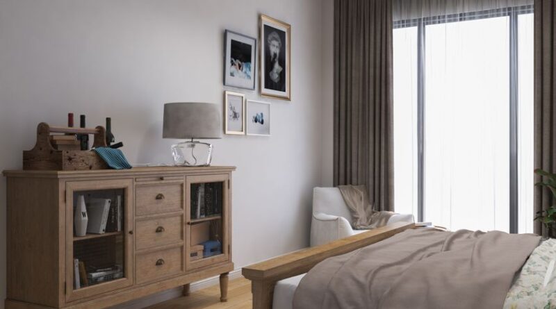 Stylish bedroom interior featuring wooden cabinet and cozy decor with natural lighting. - Photo by Đức Đào on Pexels